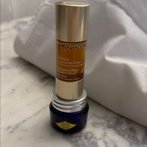 Clarins Radiance-Plus Booster with Gold and Blue Accents